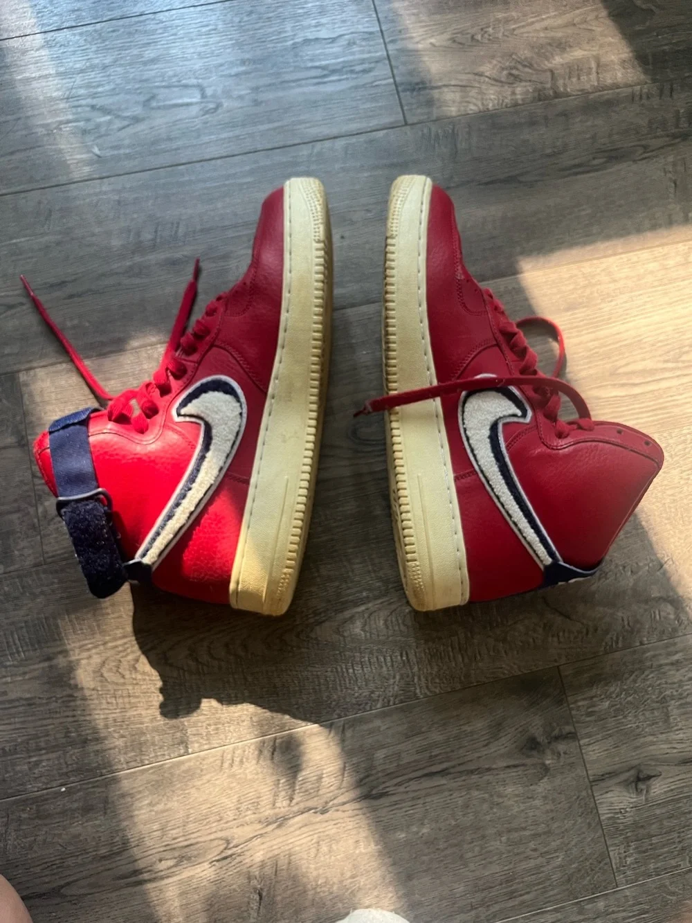 Nike Red High-Top Sneakers with White and Navy Swoosh